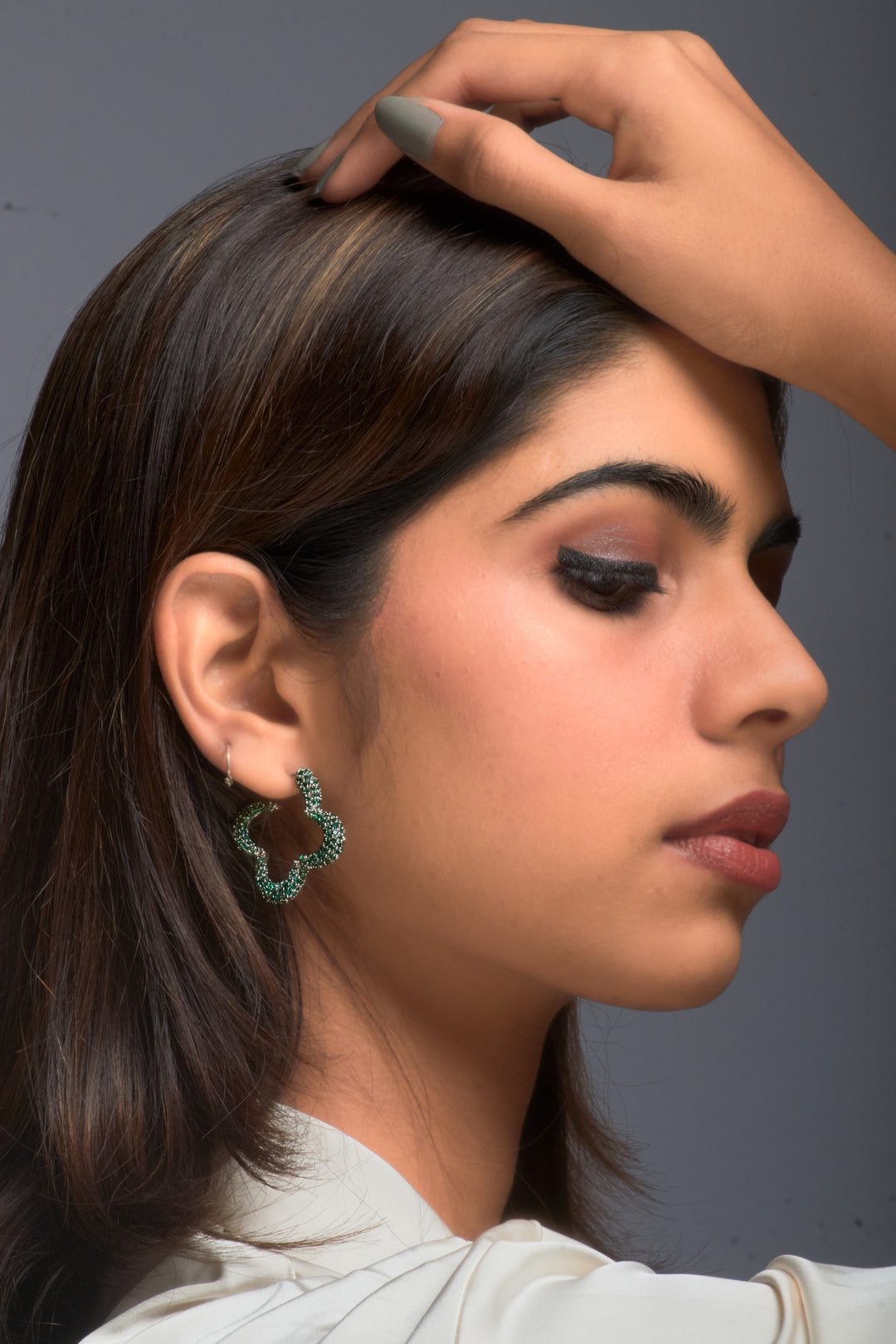 Mini Bella hoop earrings in emerald green.